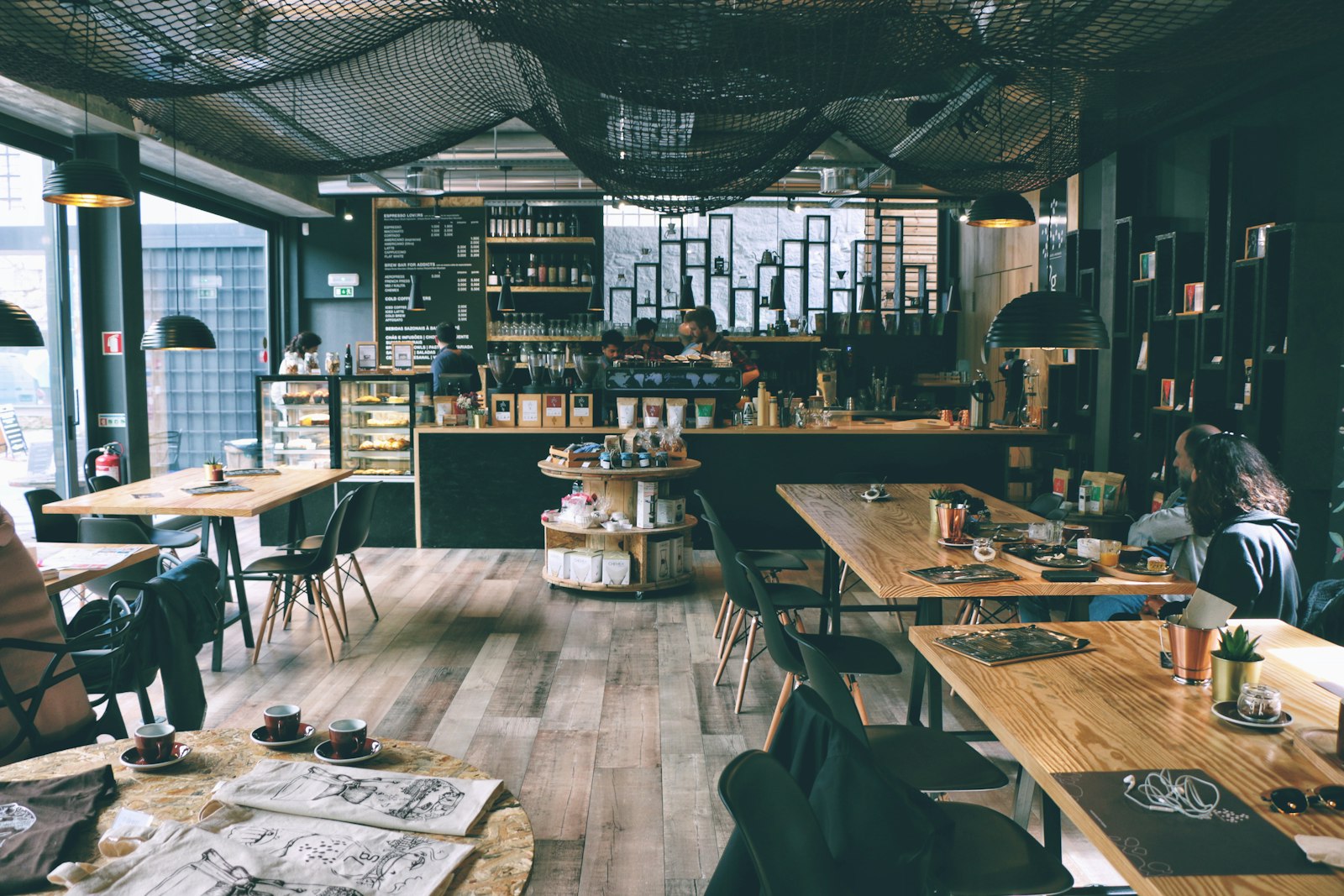 Barista serving coffee